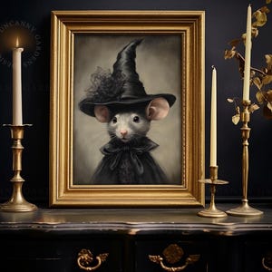 May include: A painting of a mouse dressed as a witch wearing a black hat and a black dress with a white lace collar. The painting is framed in gold and set against a dark background.
