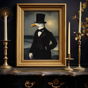 May include: A framed painting of a seagull wearing a top hat and a tuxedo, standing in front of a seascape. The painting is in a gold frame and is hanging on a dark blue wall.