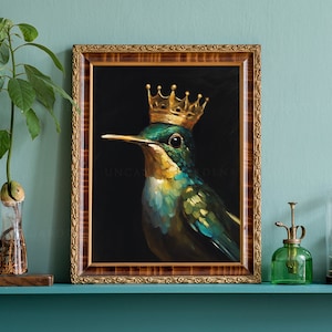 May include: A framed painting of a hummingbird wearing a gold crown against a black background. The painting is titled "Uncommon Gardens".