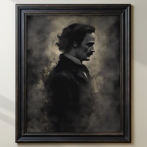 May include: A black and white portrait of a man with a mustache, wearing a dark suit and a white collar. The portrait is framed in a dark wood frame.