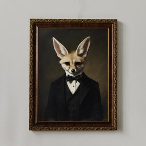 May include: Framed portrait of a dapper fox wearing a black tuxedo with a bow tie. The fox has large ears and a tan and white face. The artwork is in a dark wooden frame.