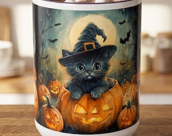 May include: A cylindrical mug with a purple interior rim and a white base, featuring a graphic illustration of a black kitten wearing a witch hat sitting inside a carved jack-o'-lantern surrounded by other pumpkins, bats, and a full moon.