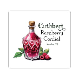 May include: A square sticker featuring a watercolor illustration of a raspberry cordial bottle. The bottle is filled with a red liquid and raspberries, topped with a cork. Text reads "Cuthbert Raspberry Cordial" and "Avonlea, PEI".