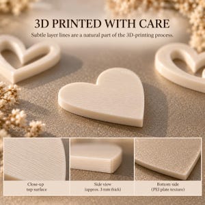 May include: Off-white 3D printed heart-shaped objects with visible layer lines. Text reads: 3D PRINTED WITH CARE. Subtle layer lines are a natural part of the 3D-printing process. Includes close-up, side view at 3 mm thick, and bottom view.