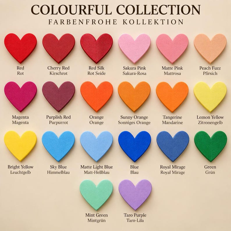 May include: A color chart titled COLOURFUL COLLECTION FARBENFROHE KOLLEKTION featuring twenty-three heart-shaped swatches in various shades including red, pink, orange, yellow, blue, green, and purple, each labeled with its specific color name.