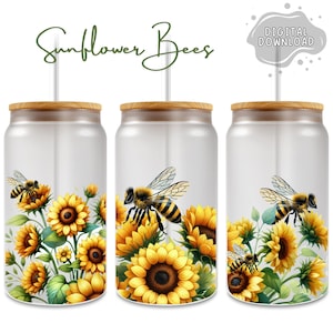 May include: Three white tumblers with a wood lid and a straw. Each tumbler features a design of sunflowers and bees. The text "Sunflower Bees" is at the top of the image.