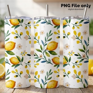 Pode incluir: Caneca branca com um padrão de limão e floral. O design apresenta limões amarelos, folhas verdes e pequenas flores brancas e rosa. A caneca tem uma palhinha prateada e o texto "PNG File only digital download".