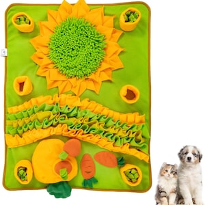 May include: A green and yellow felt dog activity mat with a sunflower, carrots, and a pumpkin design. The mat has various textures and shapes for dogs to explore and play with.
