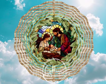 May include: A stained glass depiction of the Holy Family, Mary, Joseph, and baby Jesus, surrounded by olive branches and a gold background. The image is set against a blue sky with white clouds.