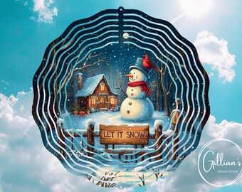 May include: A winter-themed metal wind spinner with a snowman, a small house, and a red cardinal. The spinner has a layered design with a blue and white color scheme. The text "Let It Snow" is on a wooden sign in front of the snowman.
