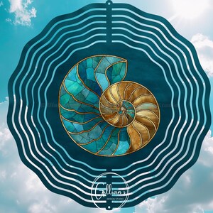 May include: A round, decorative wind spinner featuring a nautilus shell design. The shell is rendered in shades of teal and gold, with a stained-glass effect. The background is a deep teal, and the outer edge has a wavy, striped pattern.