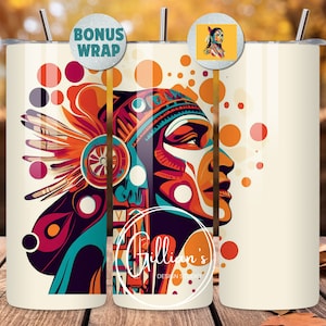 May include: A white tumbler with a colorful illustration of a Native American person wearing a headdress. The background is a cream color with orange and red circles.