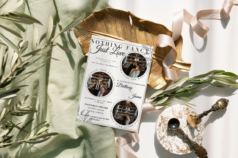May include: A wedding invitation with a white background and black text. The invitation features a floral design and two photos of the couple. The text reads "Nothing Fancy Just Love" and includes the couple's names, wedding date, and location. The invitation is on a gold leaf plate with a green plant and a pink ribbon.