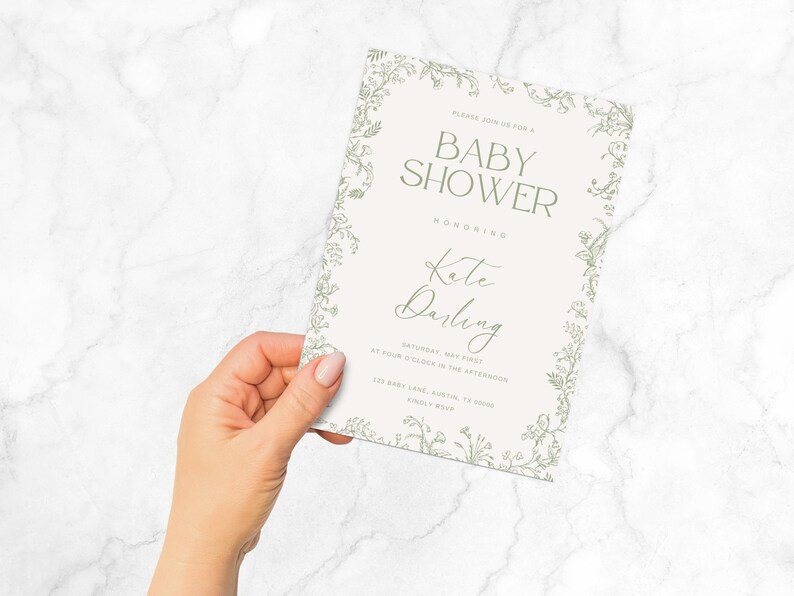 K&ouml;nnte beinhalten: Eine wei&szlig;e Babyparty-Einladung mit floralem Rand. Der Text lautet: "Bitte feiern Sie mit uns eine Babyparty zu Ehren von Kate Darling Samstag, der Erste Mai um 16:00 Uhr 123 Baby Lane, Austin, TX Bitte melden Sie sich bis zum [Datum] an"