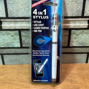 May include: A white 4-in-1 universal stylus in its original plastic packaging. The device features a stylus, LED light, laser pointer, and ink pen. The packaging includes text detailing these functions and shows a smartphone being used with the stylus.