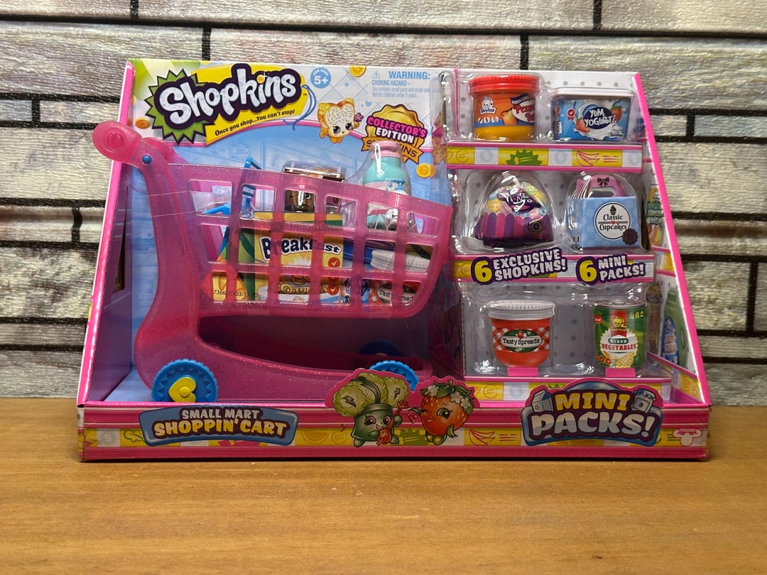 Carrito de compras Shopkins Small Mart rosa con mini paquetes