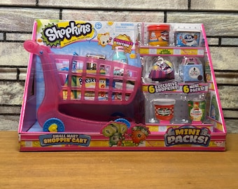 Carrito de compras Shopkins Small Mart rosa con mini paquetes