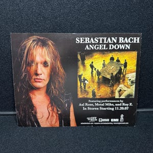 Tarjeta de evento grande "Angel Down" firmada por Sebastian Bach. Envío diario asegurado gratuito.