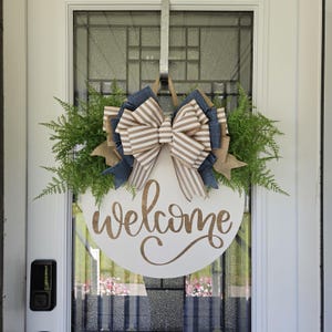 Farmhouse Welcome Door Hanger: Wood Round Sign with Striped Bow