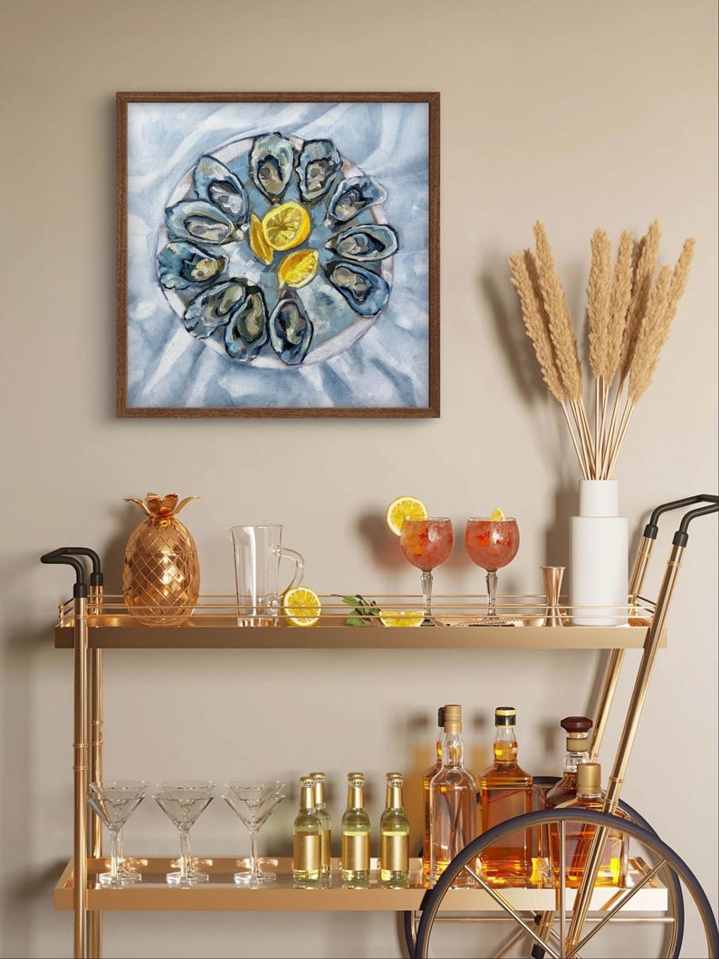 May include: A watercolor painting of a plate of oysters and lemon wedges. The oysters are arranged in a circle around the plate, and the lemon wedges are placed in the center. The painting is framed in a brown wood frame.