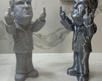 Statue of President Donald Trump Flipping the Bird - A Middle Finger for Biden and One for Harris!