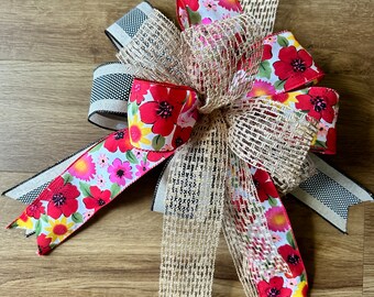 Lazo: floral rojo/naranja, arpillera de tejido abierto, cinta beige/negra