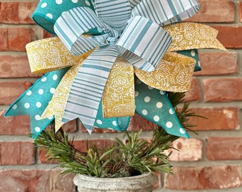 Amarillo, Turquesa, Lazo Blanco