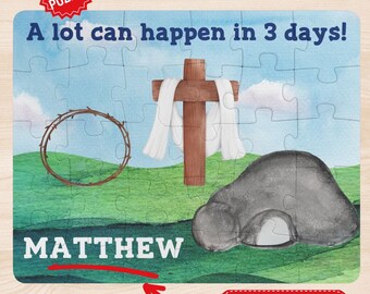 May include: A 30-piece puzzle for kids featuring a colorful illustration of the Easter story. The puzzle includes a crown of thorns, a cross, a tomb, and the words "A lot can happen in 3 days!" The puzzle is personalized with the name "MATTHEW".