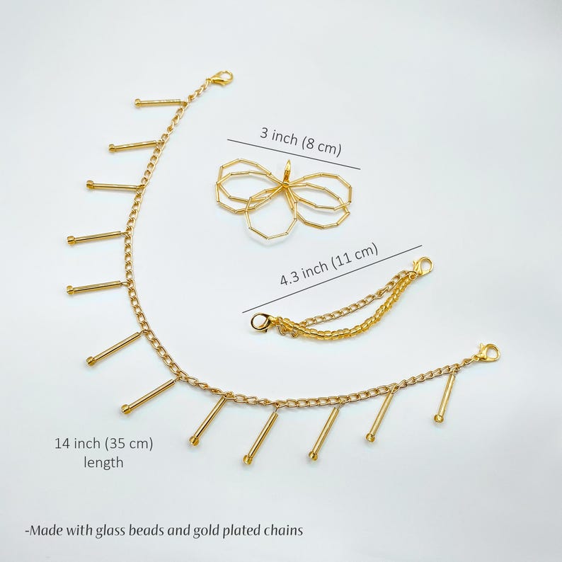 Handmade gold charm chain attached to shoes, creating a luxurious and unique touch.