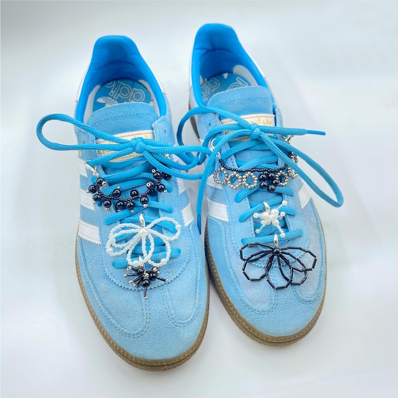 Add a Pop of Color to Your Shoes with Pearl and Black Charms.