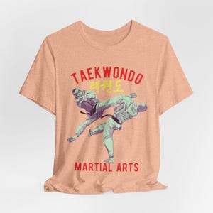 Taekwondo Power: The Art of High Kicks Unisex Jersey Short Sleeve Tee
