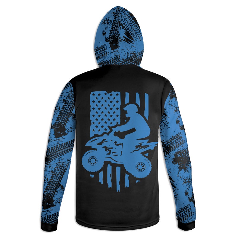 May include: Black long-sleeve hoodie with a blue and white American flag design featuring a silhouette of a person riding an ATV. The sleeves have a blue and black tire tread pattern.