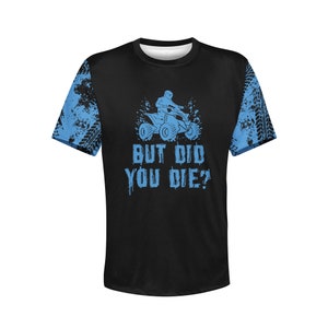 May include: Black t-shirt with a blue graphic of a person riding an ATV with the text "But Did You Die?"
