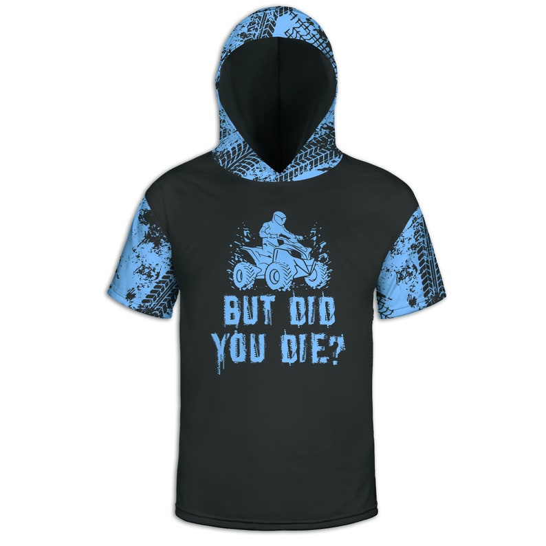 May include: Black short-sleeved hooded shirt with a blue graphic of a person riding an ATV with the text "But Did You Die?" printed on the front. The shirt has a blue and black tire tread pattern on the sleeves.