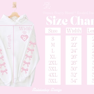 May include: Size chart for a white hooded sweatshirt with pink bows on the sleeves. The chart shows the width and length in inches for sizes S through 5XL.