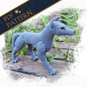 May include: A crocheted gray wolf amigurumi pattern. The pattern is available as a PDF download.