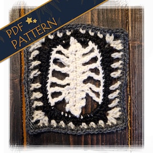 May include: A crocheted square with a rib cage design in the center. The rib cage is off-white, surrounded by a black square, and framed with a gray border. The words "PDF PATTERN" are on a navy blue banner.