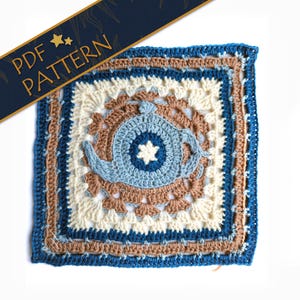 May include: A square, crocheted tea cozy pattern in shades of blue, brown, and cream. The design features a central teapot motif with a star in the middle. The words "PDF PATTERN" are displayed on a navy blue banner.