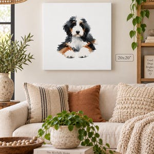 Puede incluir: Un lienzo cuadrado con una ilustraci&oacute;n en acuarela de un cachorro de boyero de Berna con pelaje negro, blanco y marr&oacute;n. La obra de arte est&aacute; etiquetada con las dimensiones 51x51 cm, mostrada sobre un fondo blanco.