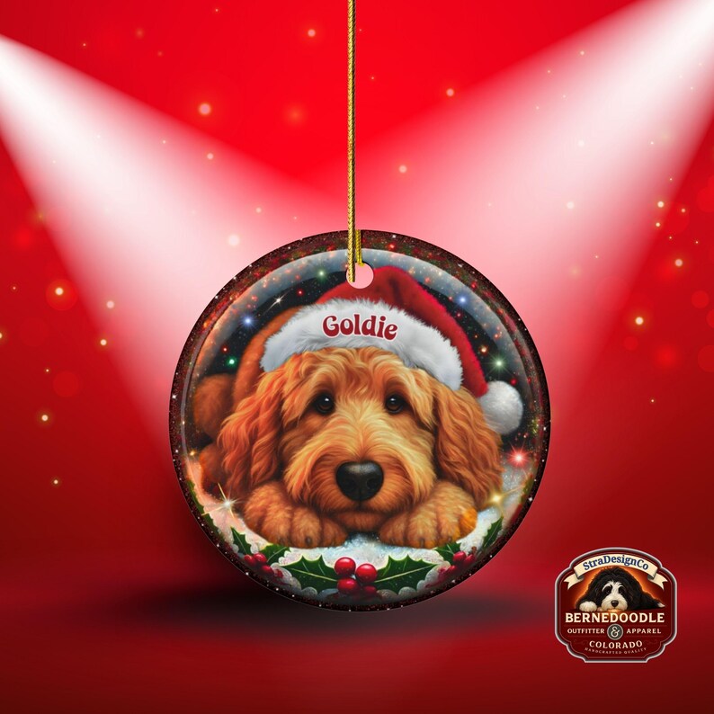Ceramic golden doodle goldendoodle doodle dog ornament with impressive snow globe style design on both sides.  Excellent doodle mom gift.  Goldendoodle holiday heirloom gift and Christmas Tree Ornament!