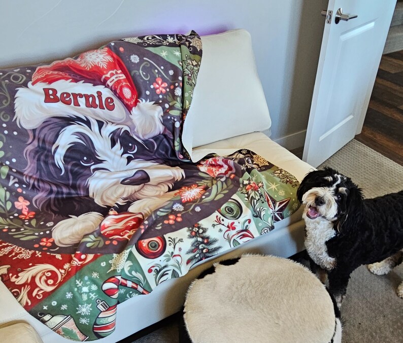Sweet Bernie The Bernedoodle, surrounded by amazing Christmas motif, captured on a gorgeous sherpa fleece blanket!