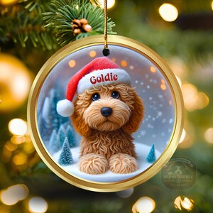 Goldendoodle ceramic 3 inch ornament in vibrant color and claymation style design.  Full gloss and printed on both sides.  It's hung with a gold string.