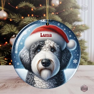 Sheepadoodle Ceramic Ornament, showcasing stunning blue eyes. Personalized ornament with your dogs name