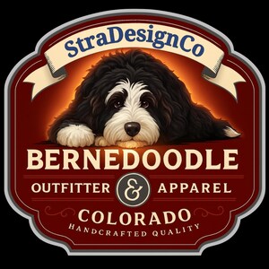 May include: A logo featuring a Bernedoodle dog with black and white fur, resting on a red background. The logo includes the text "StraDesignCo," "BERNEDOODLE OUTFITTER & APPAREL," and "COLORADO HANDCRAFTED QUALITY."