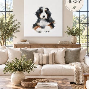 Puede incluir: Un lienzo cuadrado con una ilustraci&oacute;n en acuarela de un cachorro de boyero de Berna con pelaje negro, blanco y marr&oacute;n. La obra de arte est&aacute; etiquetada con el texto 36x36 inches en la esquina superior derecha de la imagen.