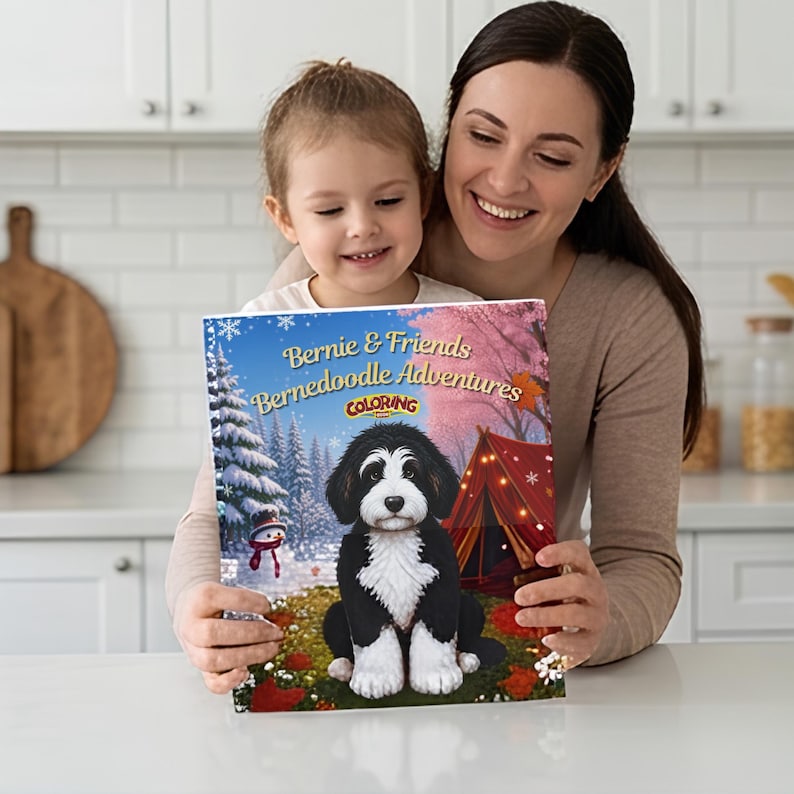 K&ouml;nnte beinhalten: Ein rechteckiges Malbuch mit dem Titel Bernie & Friends Bernedoodle Adventures, das auf dem Einband eine Illustration eines schwarz-wei&szlig;en Bernedoodle-Welpen vor einer winterlichen Kulisse mit Schneemann, rotem Zelt und Schneeflocken zeigt.