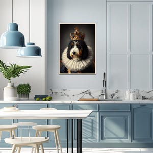 May include: A framed portrait of a dog wearing a gold crown and a ruffled collar. The dog has black, brown, and white fur. The portrait is set against a dark background.