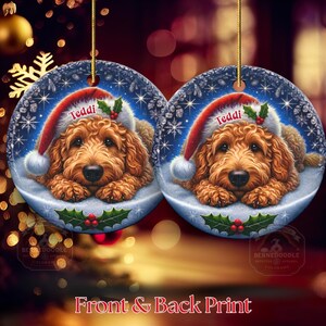 Golden Doodle dog ceramic ornament show hanging with a gold string.  The Goldendoodle Dog ornament measures 3 inches in diameter and is a full gloss, printed on both sides.
