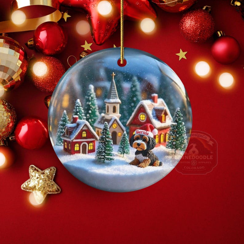 Snow globe style design personalized ceramic bernedoodle ornament with a warm backdrop Christmas dog ornament with festive winter scene.  Great gift idea for doodle moms and doodle dog lovers!