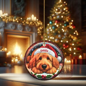 Ceramic golden doodle goldendoodle doodle dog ornament with impressive snow globe style design on both sides.  Excellent doodle mom gift.  Goldendoodle holiday heirloom gift and Christmas Tree Ornament!